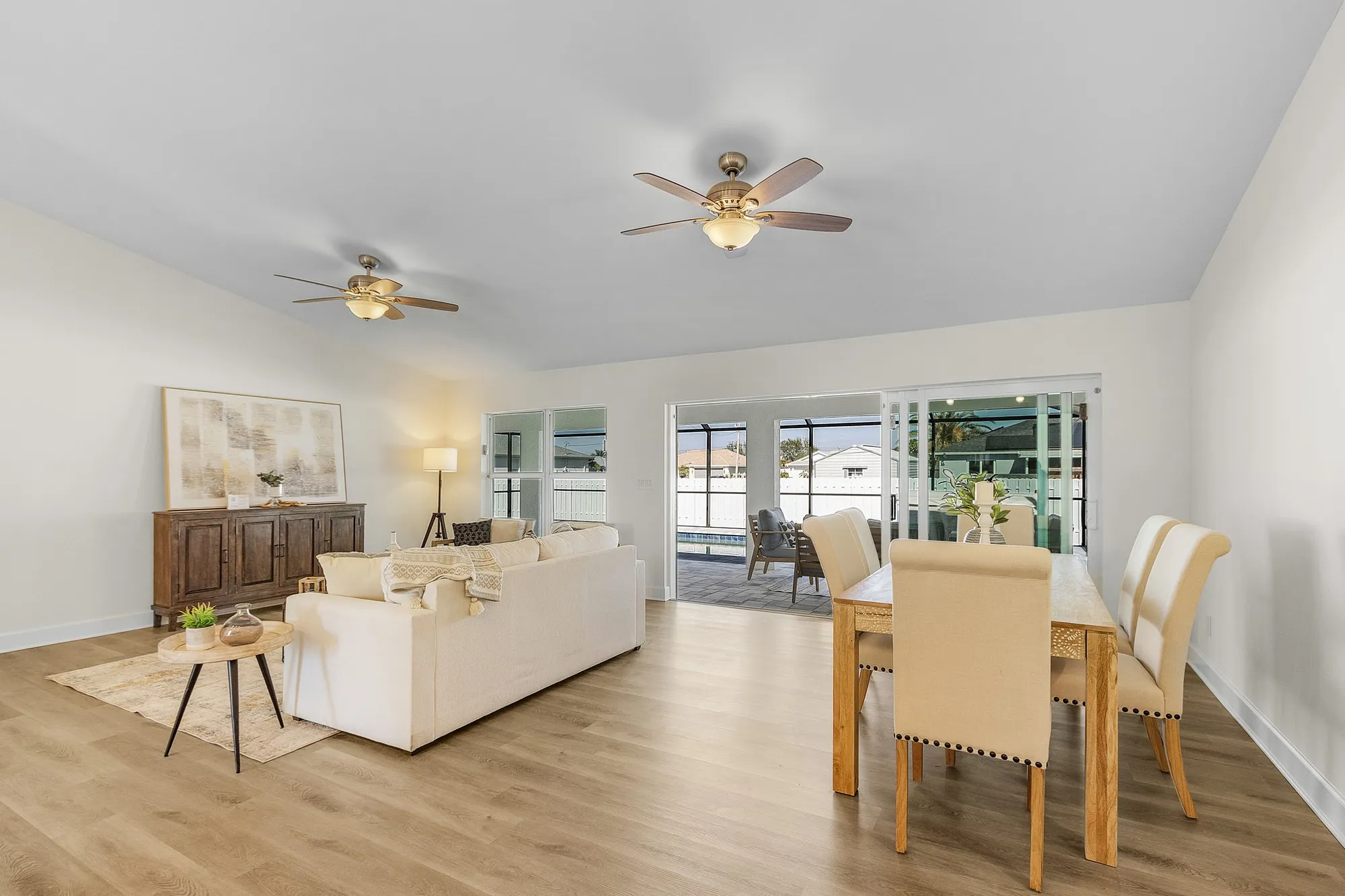 Open living and dining room with sliding glass doors