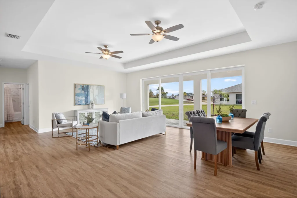 Open living and dining room with sliding glass doors