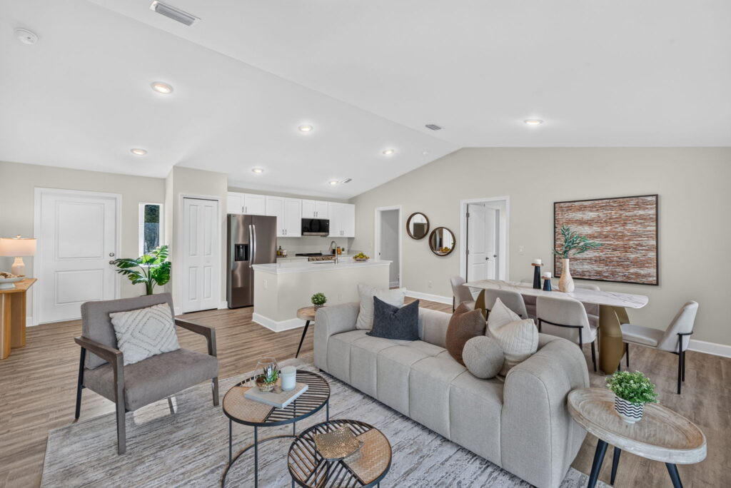 Open concept living room with kitchen and dining area