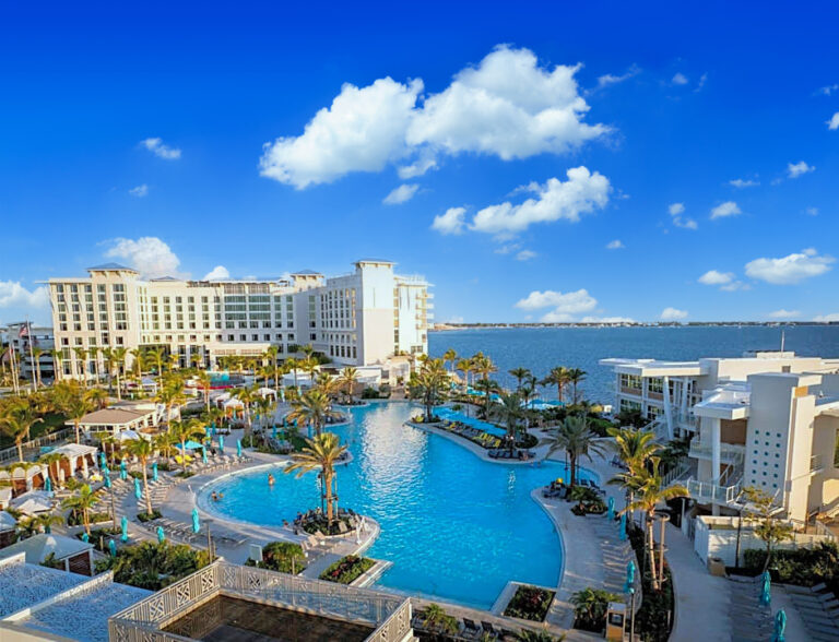The pool and Charlotte Harbor at Sunseeker Resort