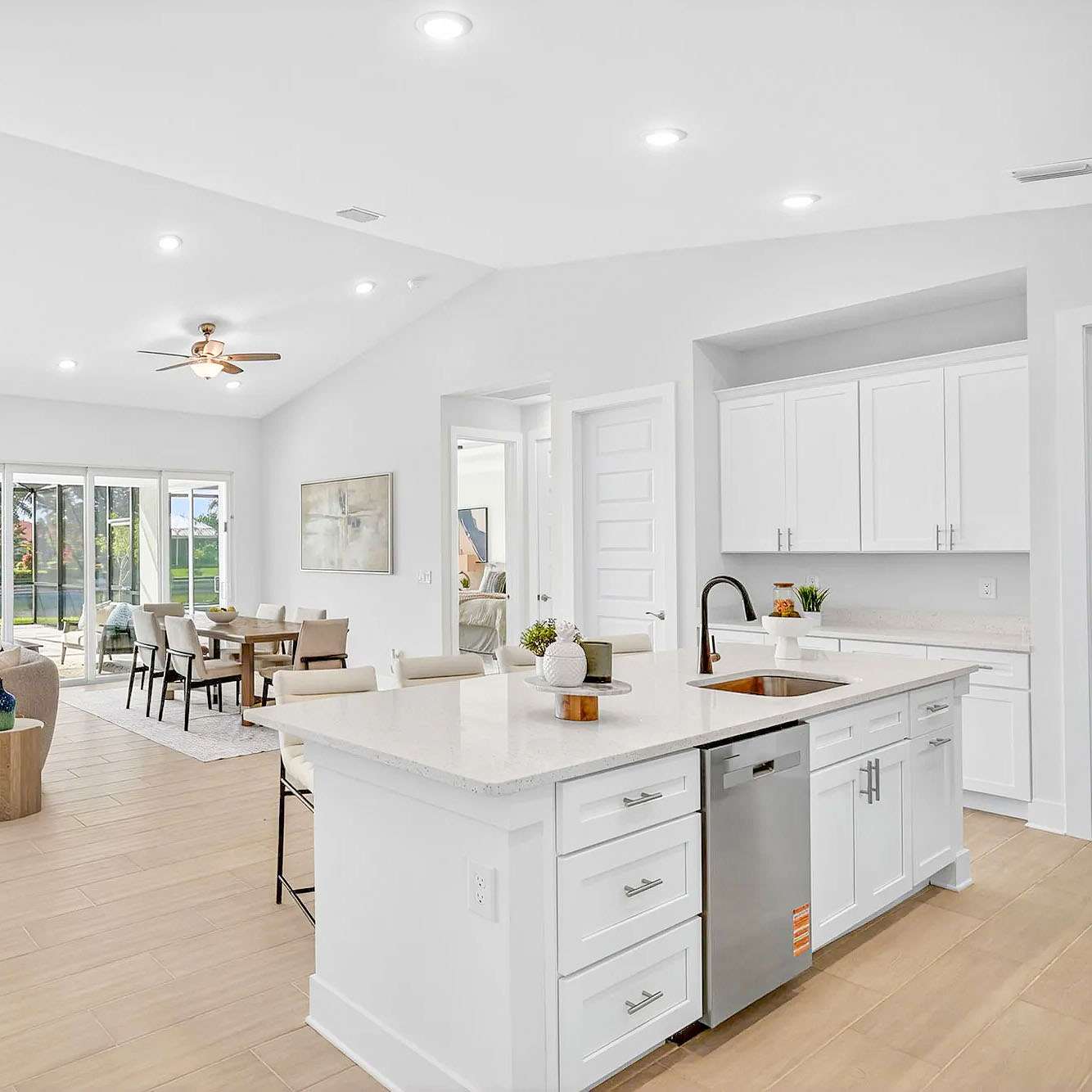 Quartz countertops and natural light in a SunLife Coral Haven kitchen